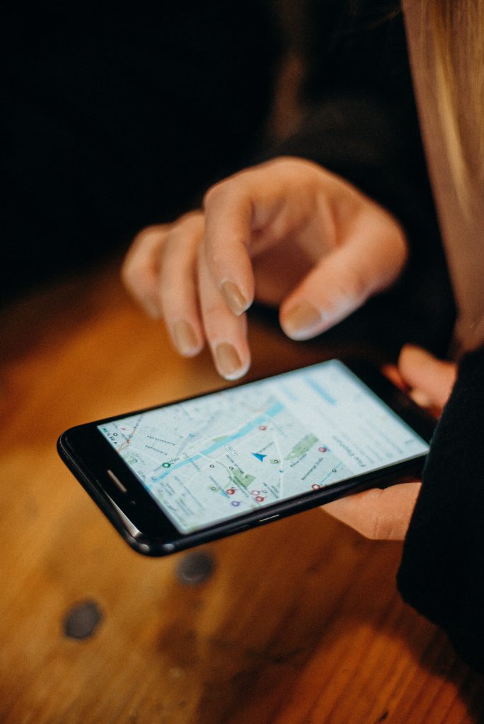 Person using maps on their phone