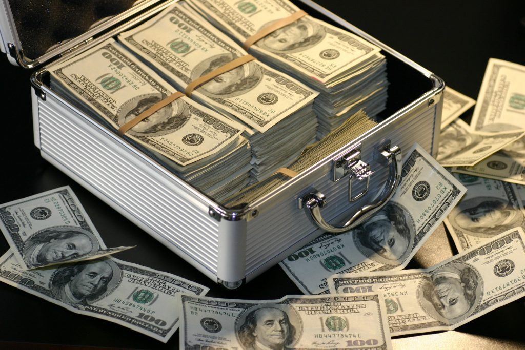 An image of a case full of money to represent the Creator Fund.