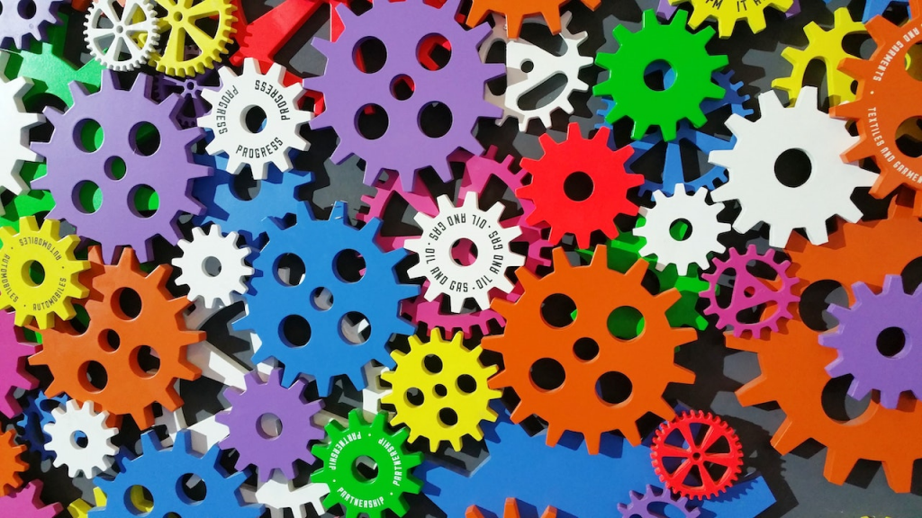 An image of multiple cogs turning to represent automation. 