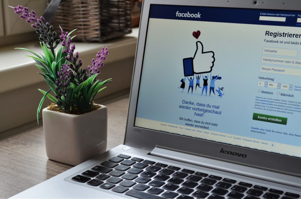 An image of the login screen for facebook on a lenovo laptop.